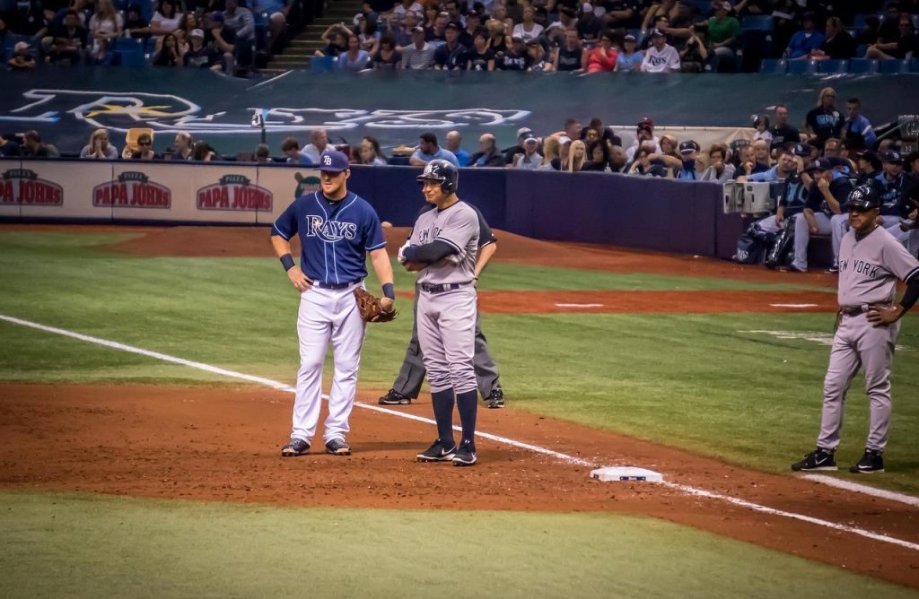 Tigers pull away in 6-run 9th, avoid sweep by Rays