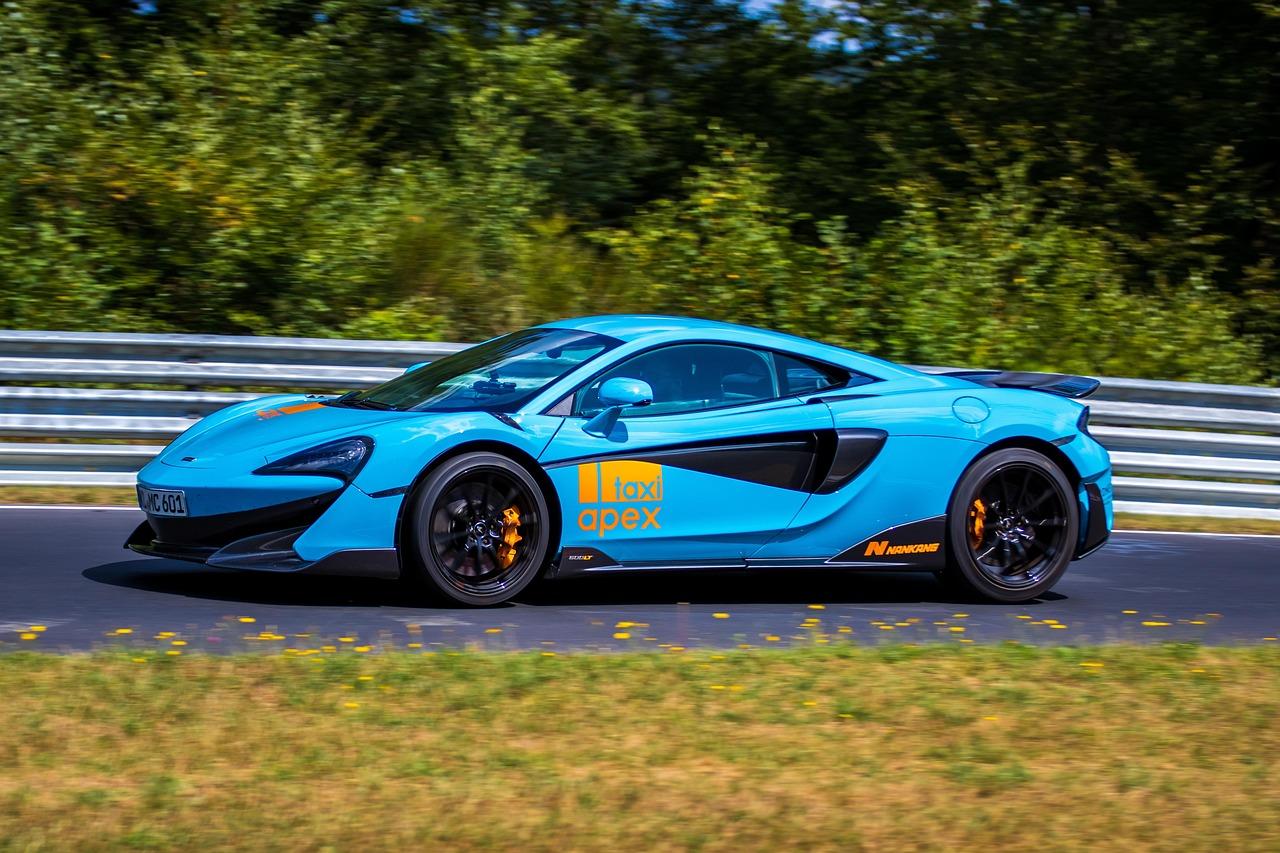 Balancing Individual Ambitions with Collective Goals in Motorsport